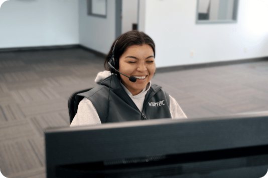 A Vianet customer service agent speaking with a customer.